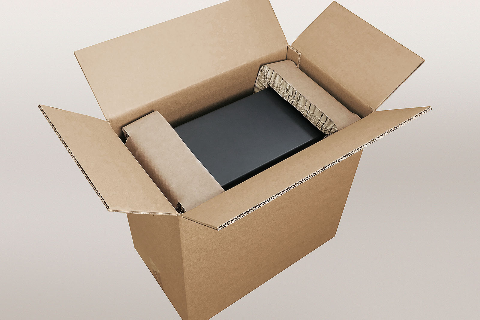 PC-Tower Versandverpackung mit Rekkor®-Wabenpolster aus Papier im Karton – nachhaltige Alternative zu EPS
